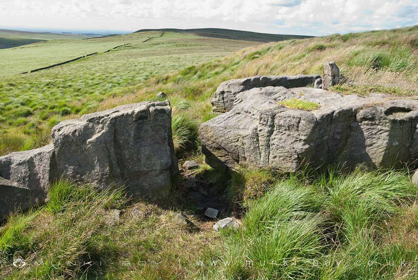 Fragments of the Hanging Stone on Turton Moor Fragments of the Hanging Stone on Turton Moor